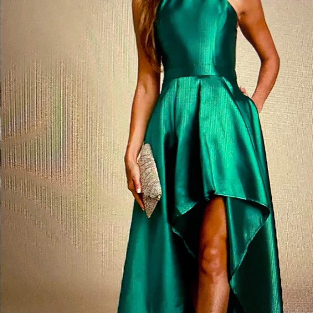 Green Satin high low dress. It’s brand new with tags. Size XL 14.